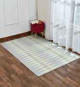 Machine washable rug featuring bold diamond motifs.